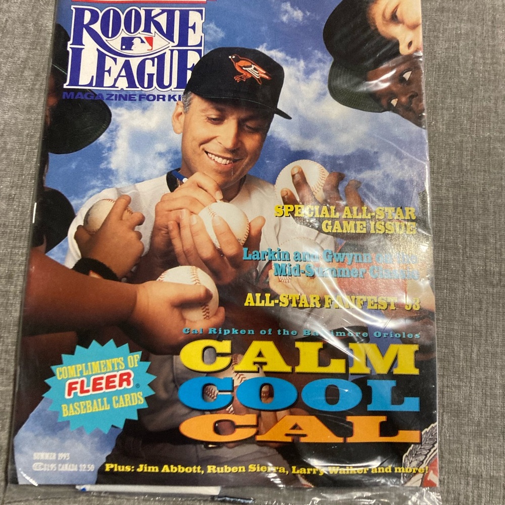 Sealed 1993 Fleer Rookie League magazine with baseball cards.